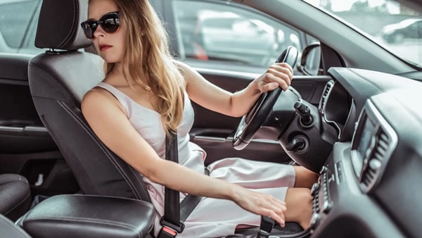 Safely backing up your vehicle includes all of the following except: