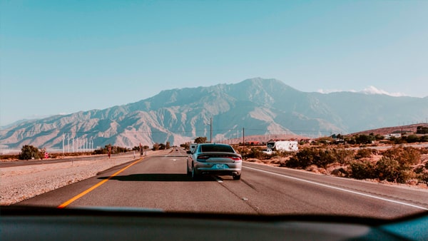 Before changing lanes on a multi-lane highway you should: