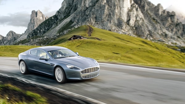 When parking downhill and the curb is absent, your front wheels must be turned: