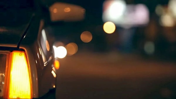 If you see warning hazard lights on a moving passenger vehicle, it means: