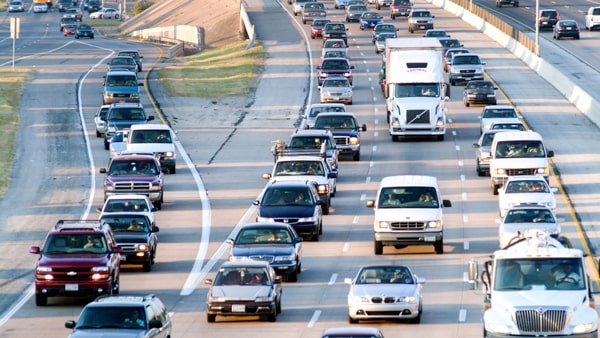When you enter a freeway, you should check traffic by using: