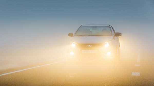 When it is very foggy, you should slow down and turn on your: