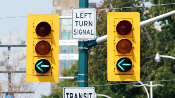 On the intersection, if you see a green arrow pointing to the left, you can:
