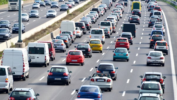 When changing lanes on a freeway, you should: