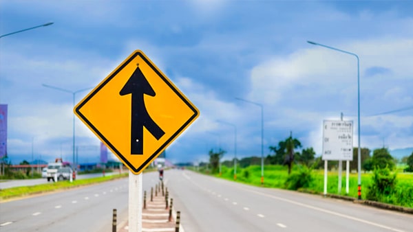 This sign warns drivers to  _____________.