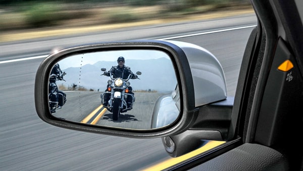 Look carefully for motorcycles before you change lanes because: