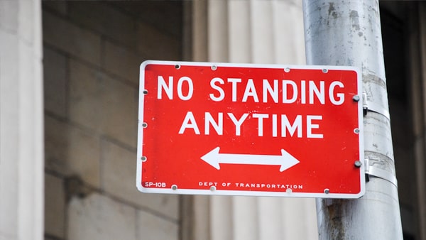 A "no standing sign" at a certain location means: