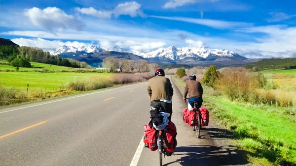 When passing a bicyclist, you should: