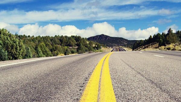 You may cross a double line to pass another vehicle if the line on your side is: