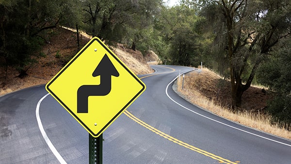 This sign warns drivers to  _____________.