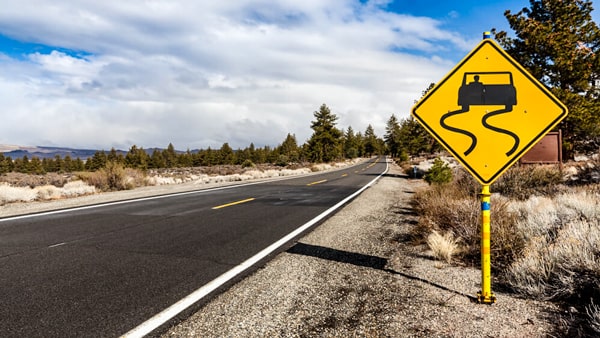 This sign warns drivers to  _________________.