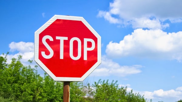 When you see this sign, you must: